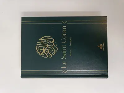 Le saint Coran : et la traduction en langue française du sens de ses versets