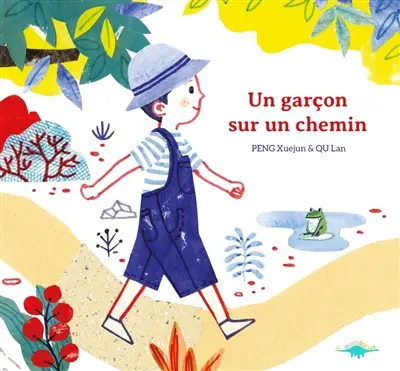 Un garçon sur un chemin