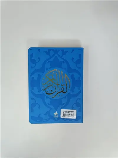 Le saint Coran : et la traduction en langue française du sens de ses versets, et la transcription en caractères latins, en phonétique : couverture cuir bleu ciel